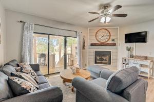 a living room with two couches and a fireplace at Full Moon Harbor in Horseshoe Bay