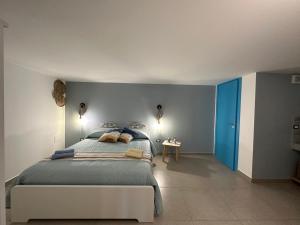 Postel nebo postele na pokoji v ubytování La Casetta sul mare