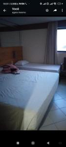 Cama o camas de una habitación en Flat Suite Natal