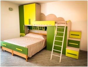 A bed or beds in a room at Casa Larentu
