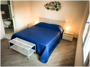 A bed or beds in a room at Casa Larentu
