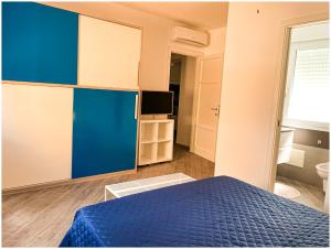 A bed or beds in a room at Casa Larentu