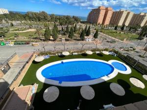 Bazén v ubytování Marina Dor Costa de Azahar I Oropesa del Mar - Vistas al Mar - Planta 4 nebo v jeho okolí