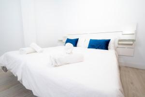 A bed or beds in a room at Alojamientos el Bajón
