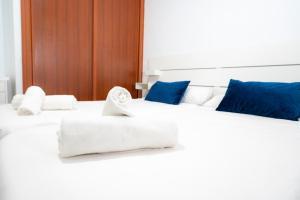 A bed or beds in a room at Alojamientos el Bajón