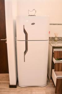 Η κουζίνα ή μικρή κουζίνα στο Suites Salta