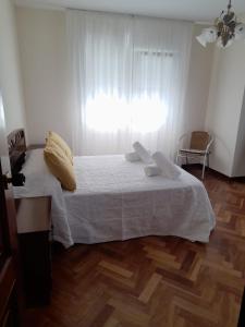A bed or beds in a room at Xardin Még 3 kép