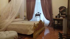 Posteľ alebo postele v izbe v ubytovaní B&B Vittoria Colonna