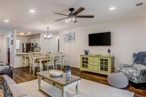 a living room with a couch and a table at Beckenham 209 in Hilton Head Island