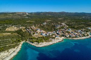 an aerial view of a resort on the shore of the ocean at Apartments by the sea Zecevo Rtic, Rogoznica - 10334 in Rogoznica