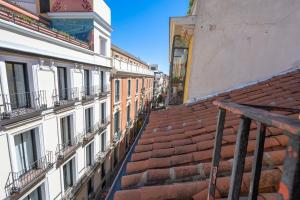 a stairway leading up to a building at Apartamentos Huertas in Madrid