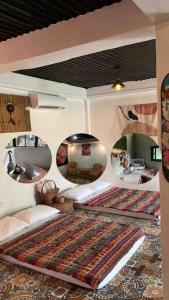 a bedroom with two beds and mirrors on the wall at Casa Ausa - Bacnotan La Union in Bacnotan