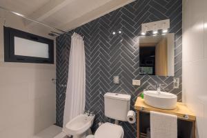 Koupelna v ubytování Complejo Playa Bonita