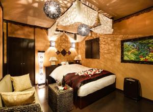 Postel nebo postele na pokoji v ubytování Hotel Asian Resort