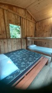 Postel nebo postele na pokoji v ubytování Cabana Toca da Serra PETAR