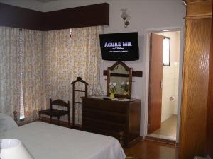 TV a/nebo společenská místnost v ubytování Hotel Santa Rita