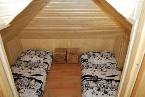מיטה או מיטות בחדר ב-Villa Muu, LaatuLomat