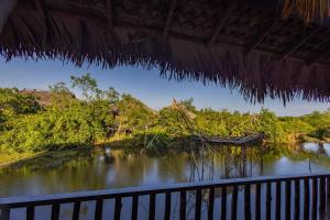 a view of a river from a bridge at Sripakpra Boutique Resort Phatthalung in Ban Pak Pra (1)