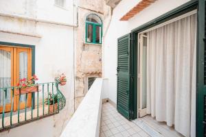 A balcony or terrace at White Amalfi Centro Storico by ItalianHost