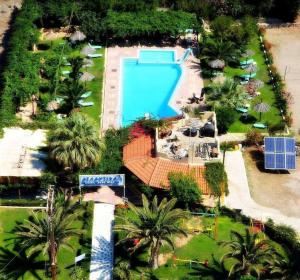 an aerial view of a resort with a swimming pool at Happy Glamping 2 in Kalamaki Heraklion