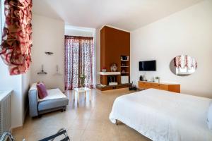 A bed or beds in a room at Le Marinelle Aff Trani