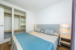 Posteľ alebo postele v izbe v ubytovaní Apartament Massanet 2c