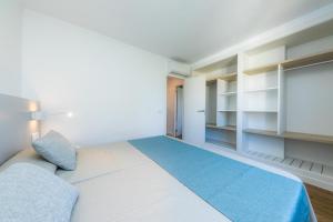 Posteľ alebo postele v izbe v ubytovaní Apartament Massanet 2c