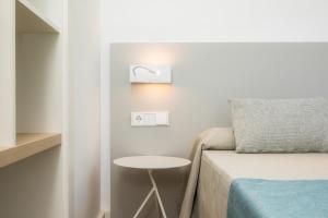 Posteľ alebo postele v izbe v ubytovaní Apartament Massanet 2c