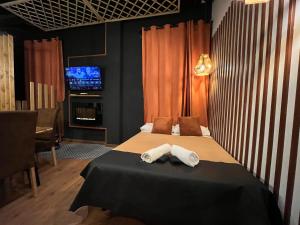 Łóżko lub łóżka w pokoju w obiekcie Chic4 luxury Gran via