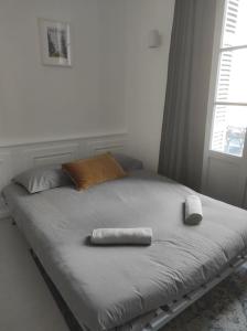 Posteľ alebo postele v izbe v ubytovaní Studio proche centre historique