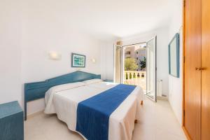 A bed or beds in a room at Oro Del Mar iv Apartamento 02 Még 19 kép