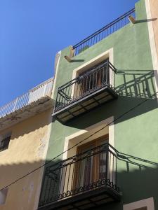 Un balcón o terraza de HAPPYVILA Apartments