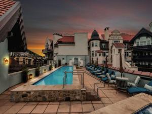 a view of a swimming pool on top of a building at Vail Arrabelle 2 Bedroom Residence in Vail +12 photos