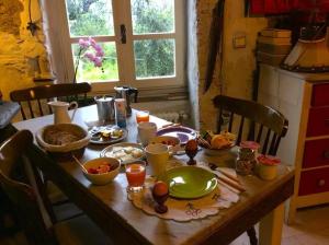 a wooden table with food on top of it at B&B Maremesco in Levanto