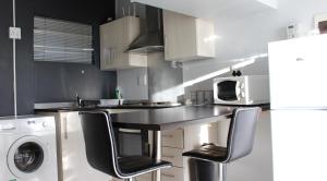 A kitchen or kitchenette at Abigail's Studio Apartment @ Trift Tower