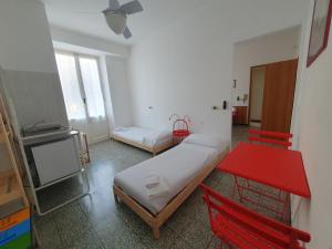Voodi või voodid majutusasutuse Hotel Zoagli toas