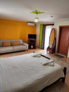 Postel nebo postele na pokoji v ubytování Guesthouse Bimbli