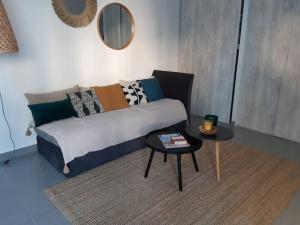 Posteľ alebo postele v izbe v ubytovaní Grand studio avec patio