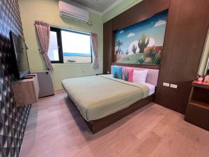 A bed or beds in a room at Fish's Home