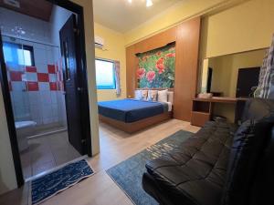 A bed or beds in a room at Fish's Home