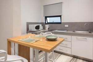 Η κουζίνα ή μικρή κουζίνα στο LeCosyCanonniersStudio1 +4 φωτογραφίες