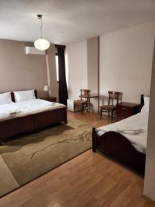 Postel nebo postele na pokoji v ubytování Guesthouse Bimbli