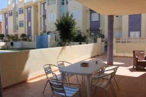 A balcony or terrace at Delfines II Solo Familias Serviplaya