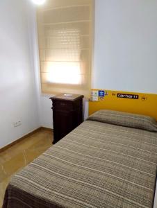 Postel nebo postele na pokoji v ubytování Casita de ensueño en Ronda