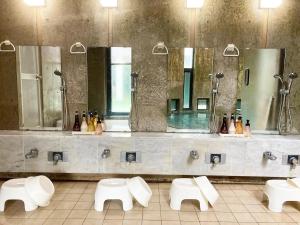 Ένα μπάνιο στο 24時間源泉掛け流しGuest House Belle Hakone