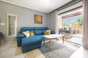 A seating area at ALTOS DEL SOL by United Renters