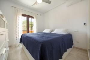 A bed or beds in a room at ALTOS DEL SOL by United Renters