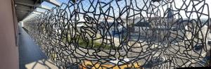 a fence with graffiti on it in a building at Studio Terrasse et parking, 4 pers par ALP Chartres in Chartres +21 photos