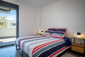 Posteľ alebo postele v izbe v ubytovaní AT307 Planta baja con piscina a pocos metros de la playa Cañadel
