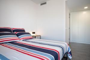 Posteľ alebo postele v izbe v ubytovaní AT307 Planta baja con piscina a pocos metros de la playa Cañadel